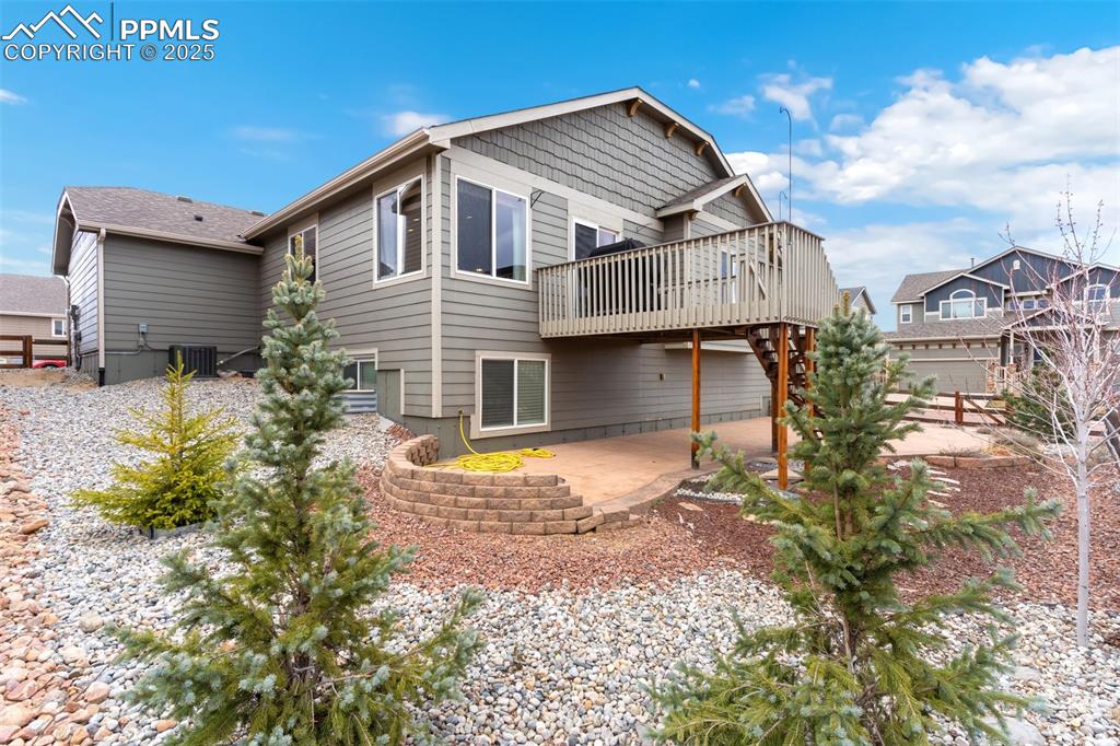 977 Salmon Pond Way Colorado Springs, CO 80921 - Photo 45 of 49 a front view of a house with a yard