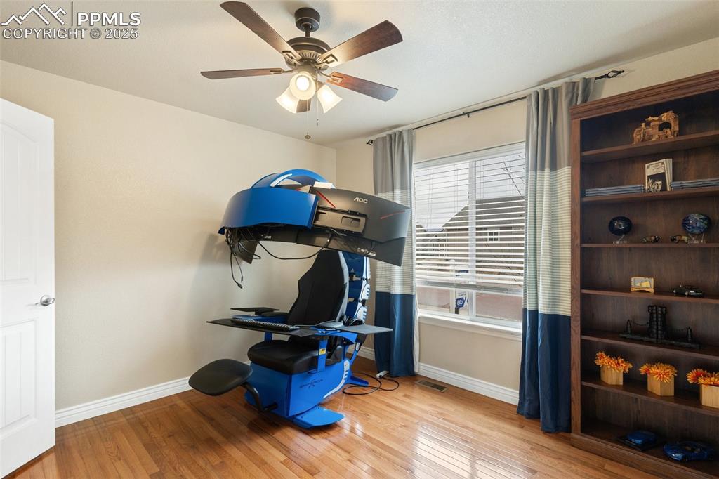 977 Salmon Pond Way Colorado Springs, CO 80921 - Photo 8 of 49 a view of a workspace with furniture and a window