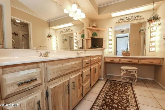 a utility room with sink dryer and washer