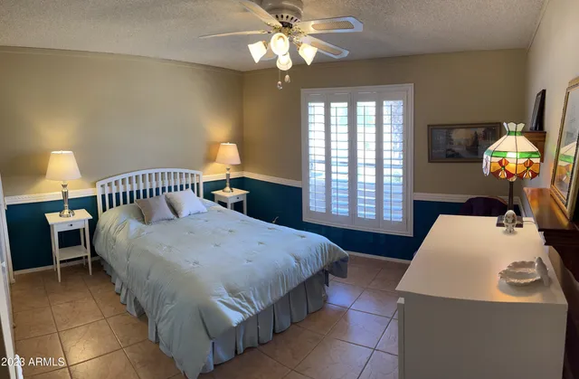 a view of swimming pool with outdoor seating