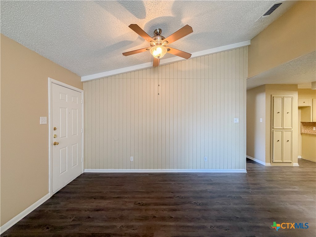 3806 Shallow Ford Road Temple, TX 76502 - Photo 4 of 20 a view of an empty room with wooden floor