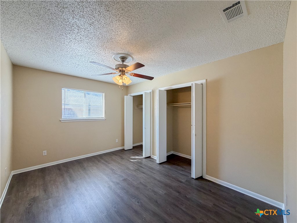 3806 Shallow Ford Road Temple, TX 76502 - Photo 8 of 20 a view of an empty room with wooden floor