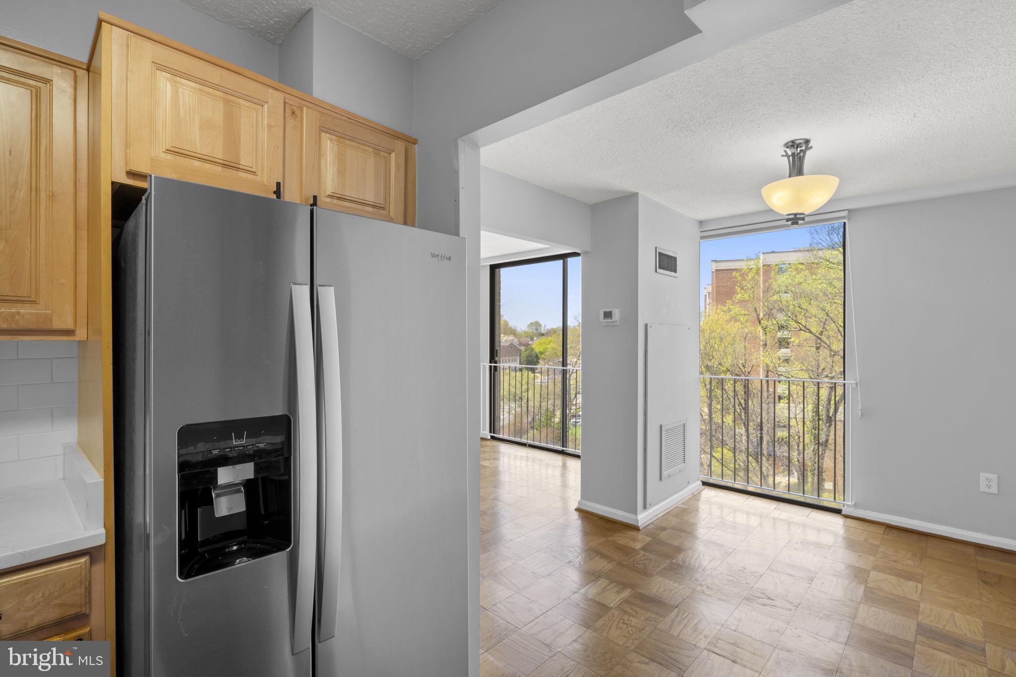 2100 Washington Avenue, Unit 9D Silver Spring, MD 20910 - Photo 16 of 29 a view of entryway with wooden floor