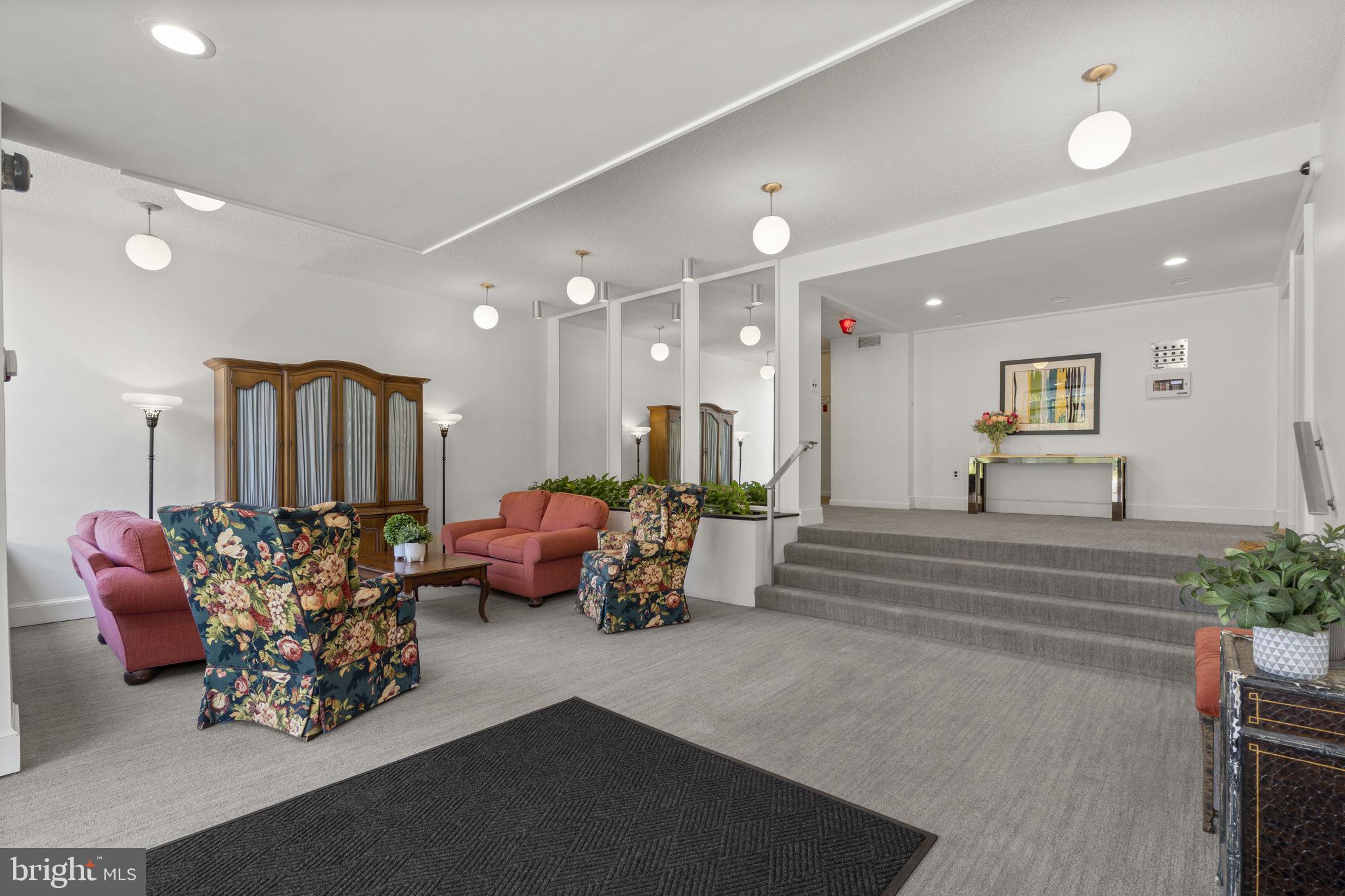 2100 Washington Avenue, Unit 9D Silver Spring, MD 20910 - Photo 4 of 29 a lobby with furniture and natural light