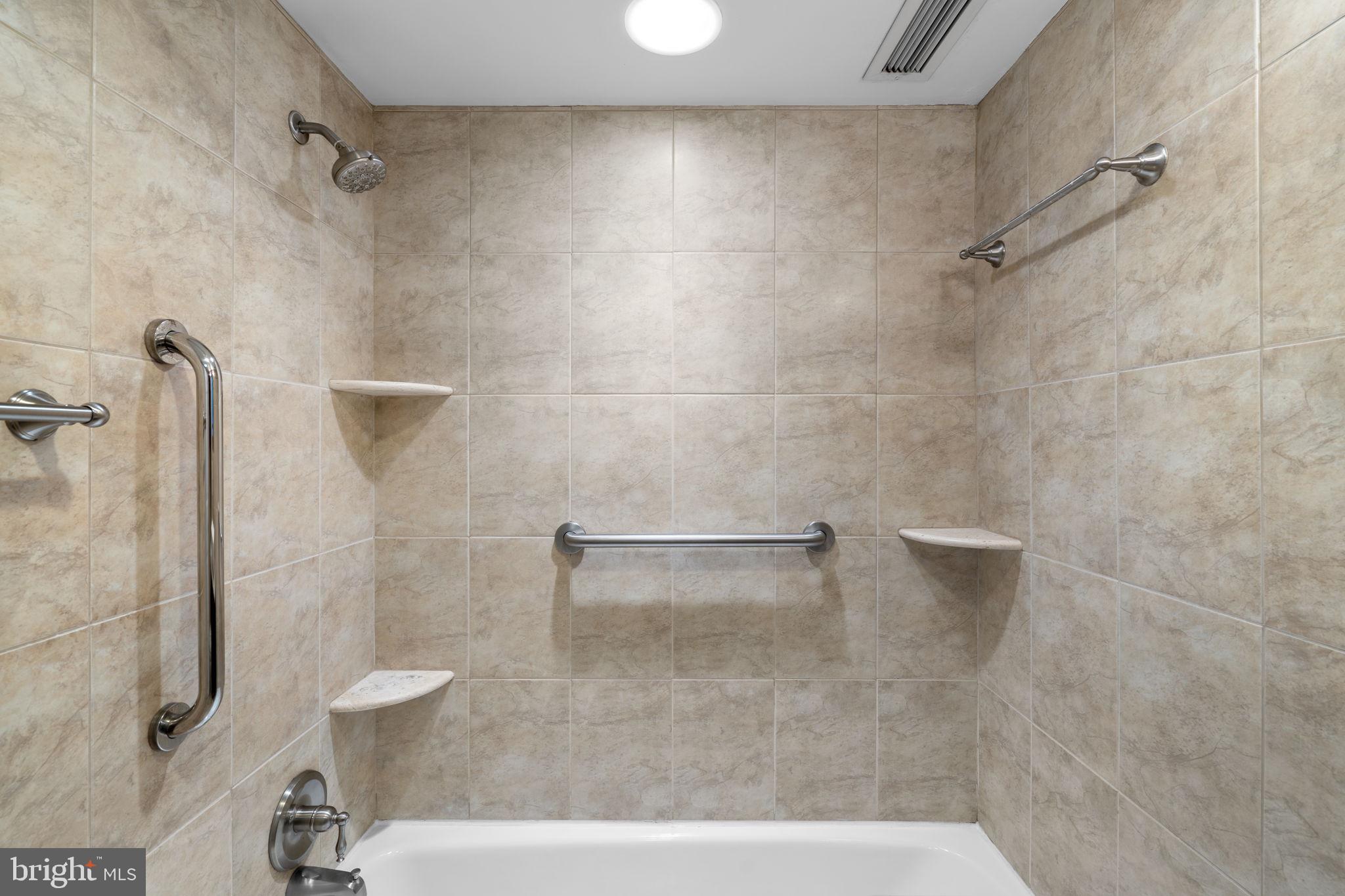2100 Washington Avenue, Unit 9D Silver Spring, MD 20910 - Photo 9 of 29 a bathroom with a shower