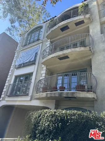 a front view of a house with a balcony