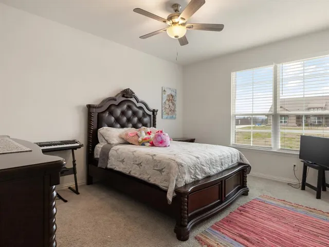 a view of a storage & utility room with wooden floor