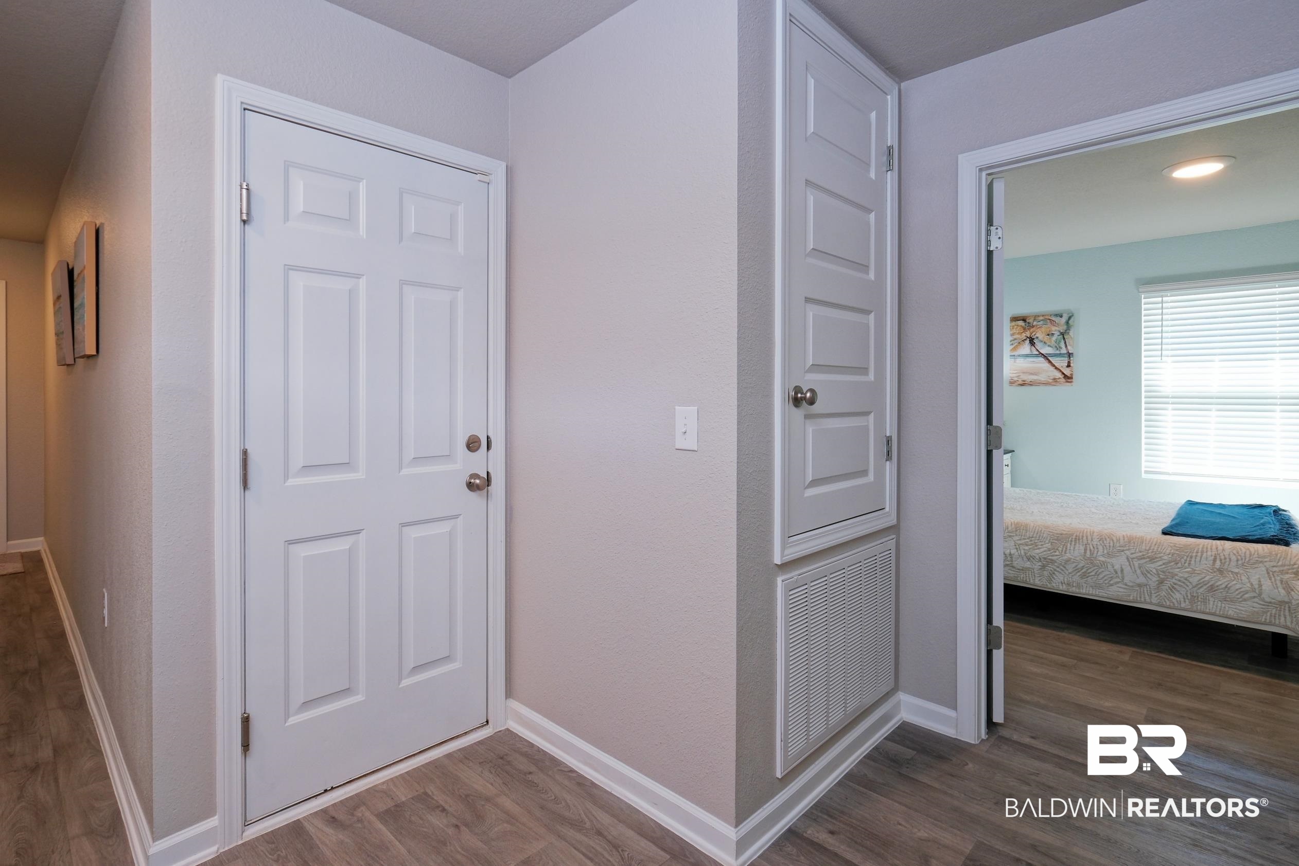 7425 Coppin Drive Foley, AL 36535 - Photo 27 of 41 Hall featuring dark hardwood / wood-style flooring