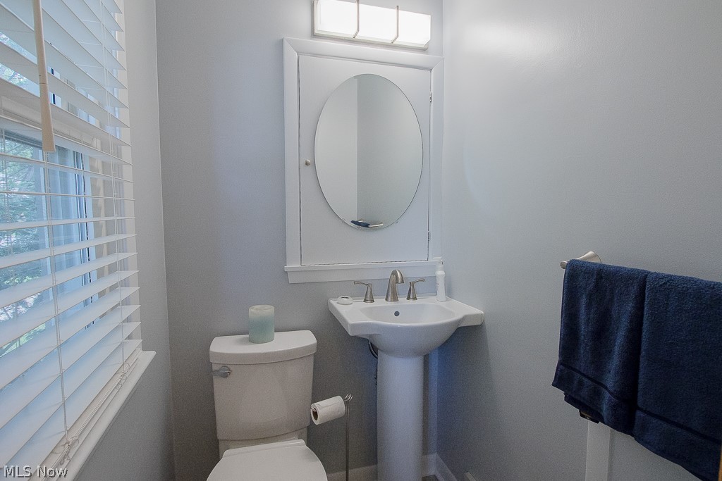 30425 Vineyard Road Willowick, OH 44095 - Photo 7 of 22 The recently updated half bathroom is conveniently located off the rear patio door and Kitchen. A nice bonus bath you don't typically find in a Willowick ranch!