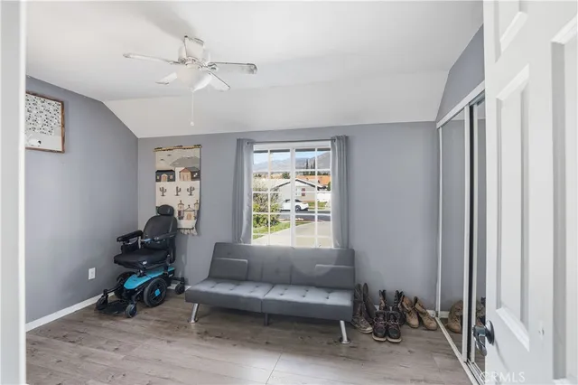 a living room with furniture and a window