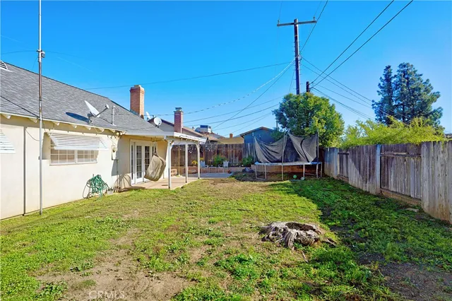 a house view with a garden space