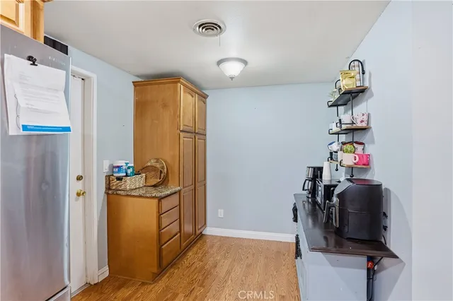 a view of a workspace with furniture and toys