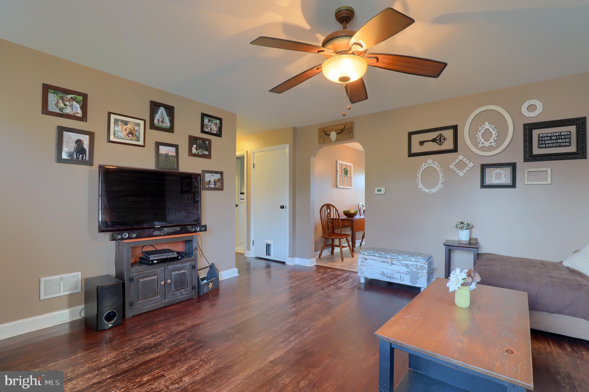 1945 Manor Ridge Drive Lancaster, PA 17603 - Photo 9 of 28 Living room view 4 with kitchen entrance