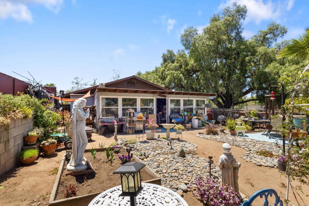 246 Robelini Drive Vista, CA 92083 - Photo 23 of 35 Backyard looking at screened in porch