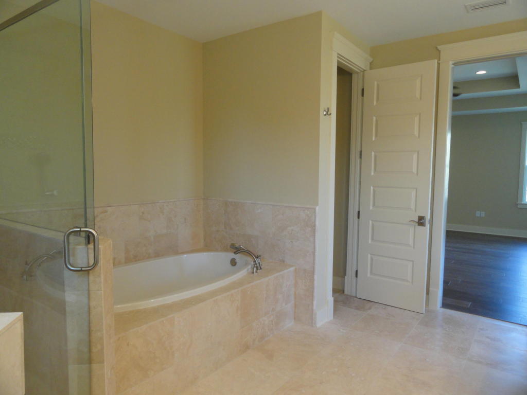 30 Prominence Square Inlet Beach Inlet Beach, FL 32461 - Photo 11 of 18 a white bath tub sitting next to a shower