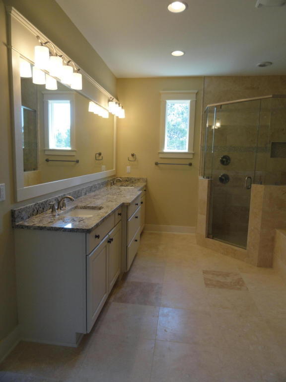 30 Prominence Square Inlet Beach Inlet Beach, FL 32461 - Photo 12 of 18 a bathroom with a granite countertop sink a mirror and a shower