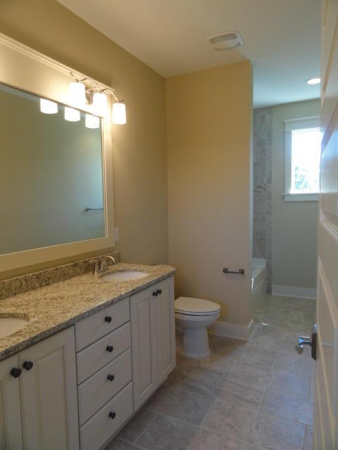 30 Prominence Square Inlet Beach Inlet Beach, FL 32461 - Photo 14 of 18 a bathroom with a granite countertop sink toilet and mirror