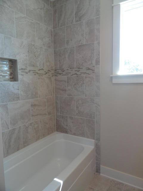 30 Prominence Square Inlet Beach Inlet Beach, FL 32461 - Photo 15 of 18 a close up of a bathtub in a bathroom