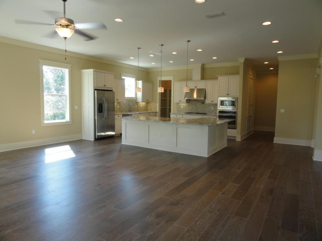 30 Prominence Square Inlet Beach Inlet Beach, FL 32461 - Photo 5 of 18 a view of a kitchen with cabinets and wooden floor