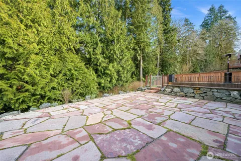 a backyard of a house with lots of green space