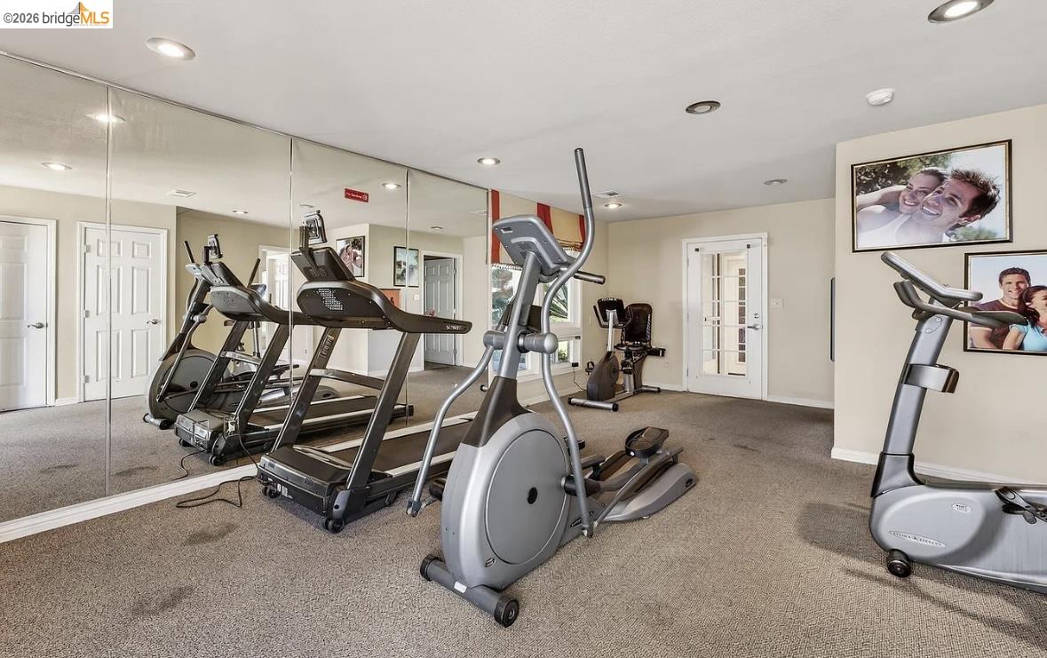 1505 Kirker Pass Road, Unit 214 Concord, CA 94521 - Photo 5 of 55 Dedicated fitness area featuring carpet flooring and mirrored wall panels