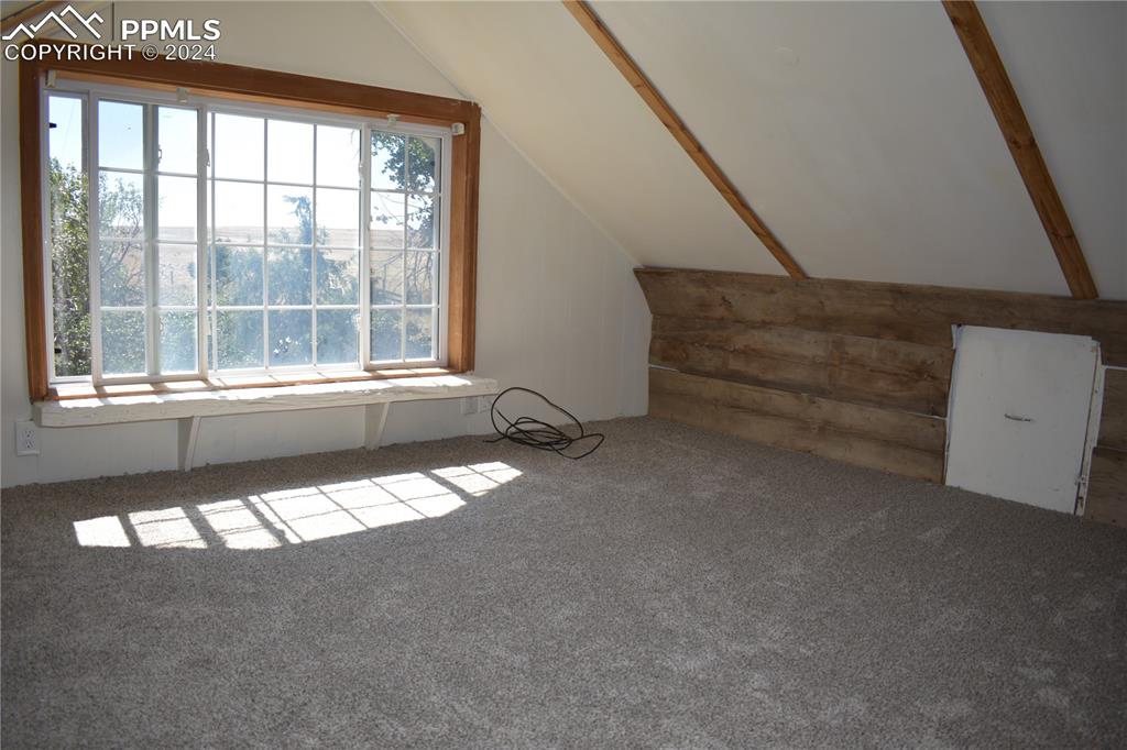 20490 Lemesany Road Calhan, CO 80808 - Photo 15 of 31 a view of an empty room and a window