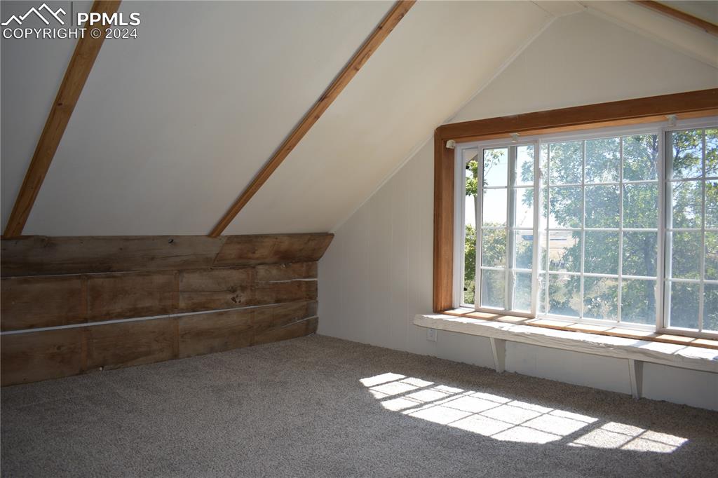 20490 Lemesany Road Calhan, CO 80808 - Photo 16 of 31 a view of wooden floor and windows in an empty room