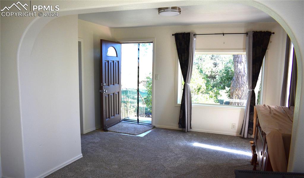 20490 Lemesany Road Calhan, CO 80808 - Photo 4 of 31 a view of livingroom with furniture and a window