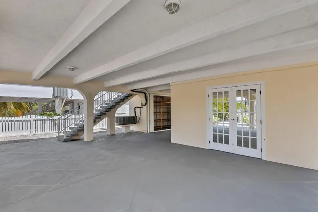 a view of an empty room with a balcony