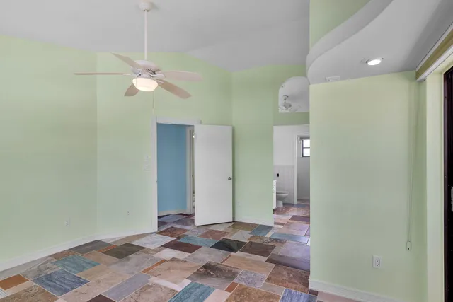 a bathroom with a sink toilet and a mirror
