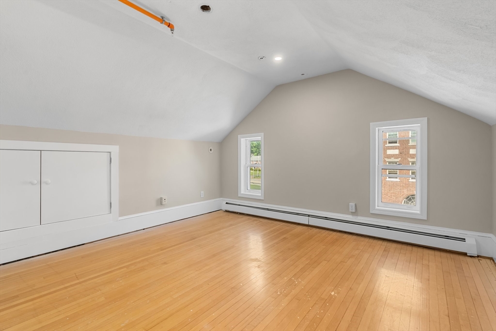 6 Windsor Street Andover, MA 01810 - Photo 23 of 34 an empty room with a window