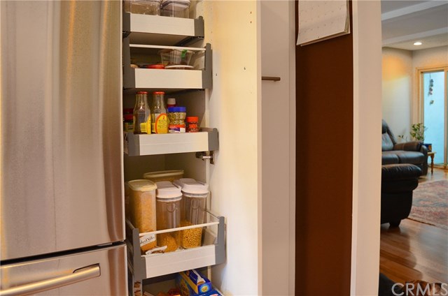 613 Rhine Lane Costa Mesa, CA 92626 - Photo 14 of 48 One of two pull out pantry systems.