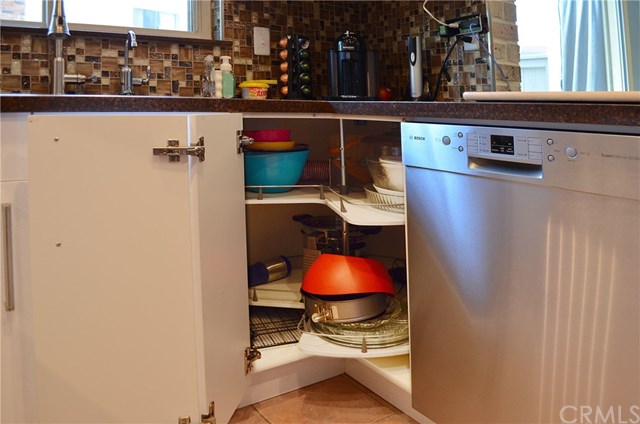 613 Rhine Lane Costa Mesa, CA 92626 - Photo 15 of 48 One of four Lazy Susans and super quiet Bosch dishwasher.