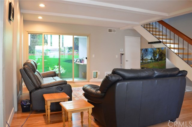 613 Rhine Lane Costa Mesa, CA 92626 - Photo 4 of 48 Family room with open air atrium.