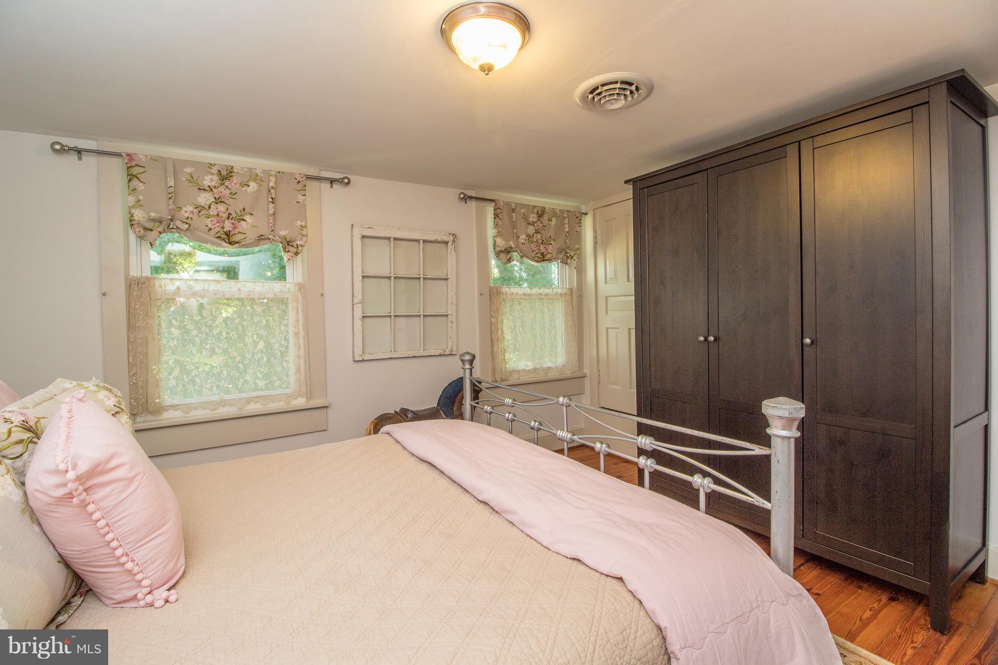 170 Camp Selden Road Fredericksburg, VA 22405 - Photo 17 of 29 a bedroom with a bed and a window