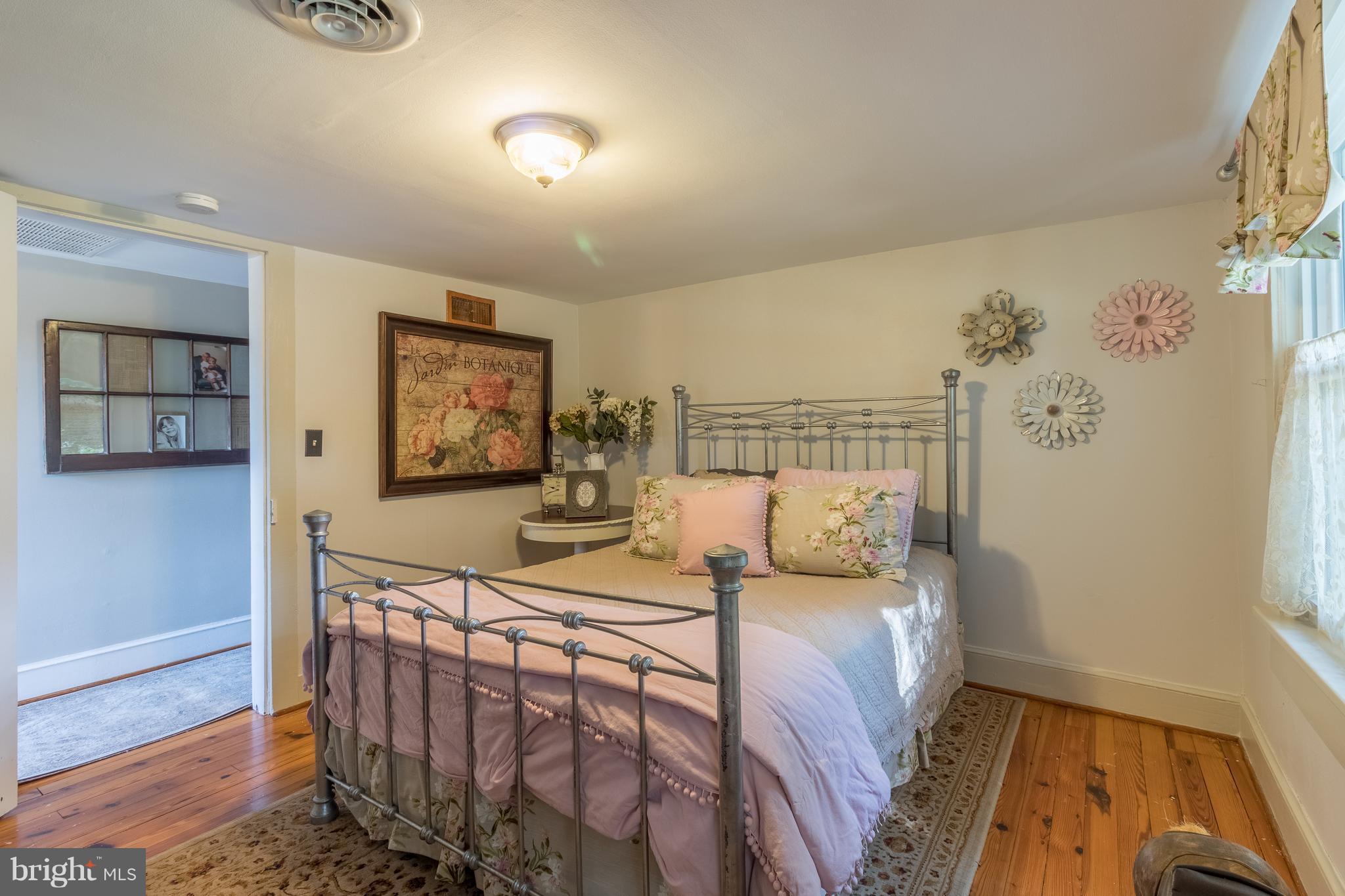170 Camp Selden Road Fredericksburg, VA 22405 - Photo 18 of 29 a bedroom with a bed and furniture