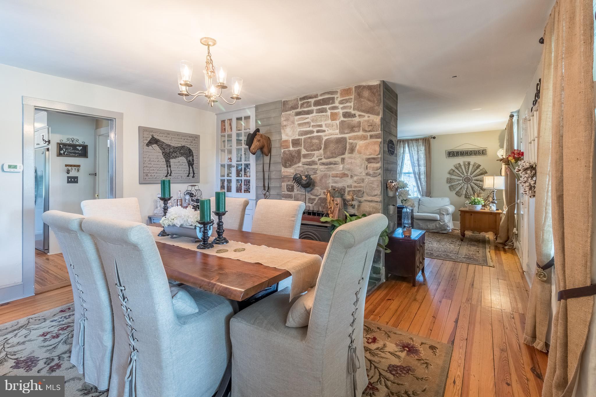 170 Camp Selden Road Fredericksburg, VA 22405 - Photo 8 of 29 a view of a dining room with furniture and wooden floor