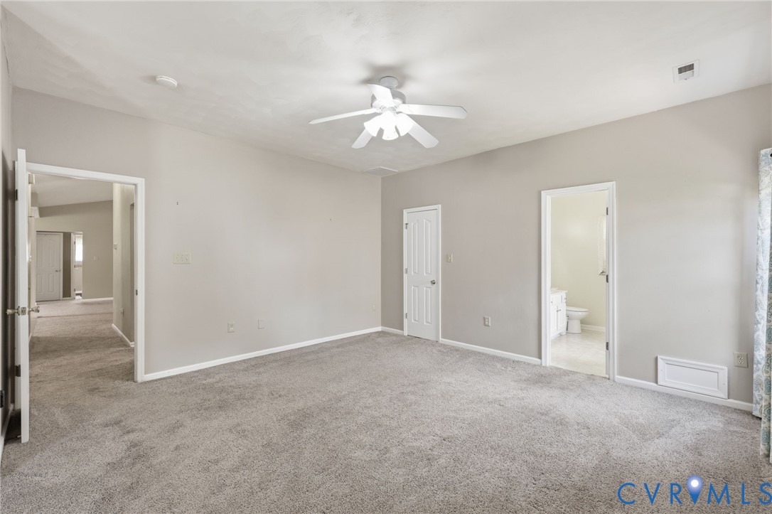 14719 Clover Ridge Lane Chesterfield, VA 23832 - Photo 20 of 36 Spacious room featuring neutral carpeting, light g