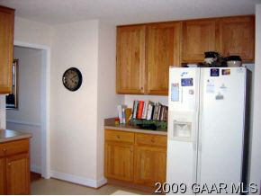50 Long Bow Road Waynesboro, VA 22980 - Photo 7 of 12 a kitchen with refrigerator and cabinets