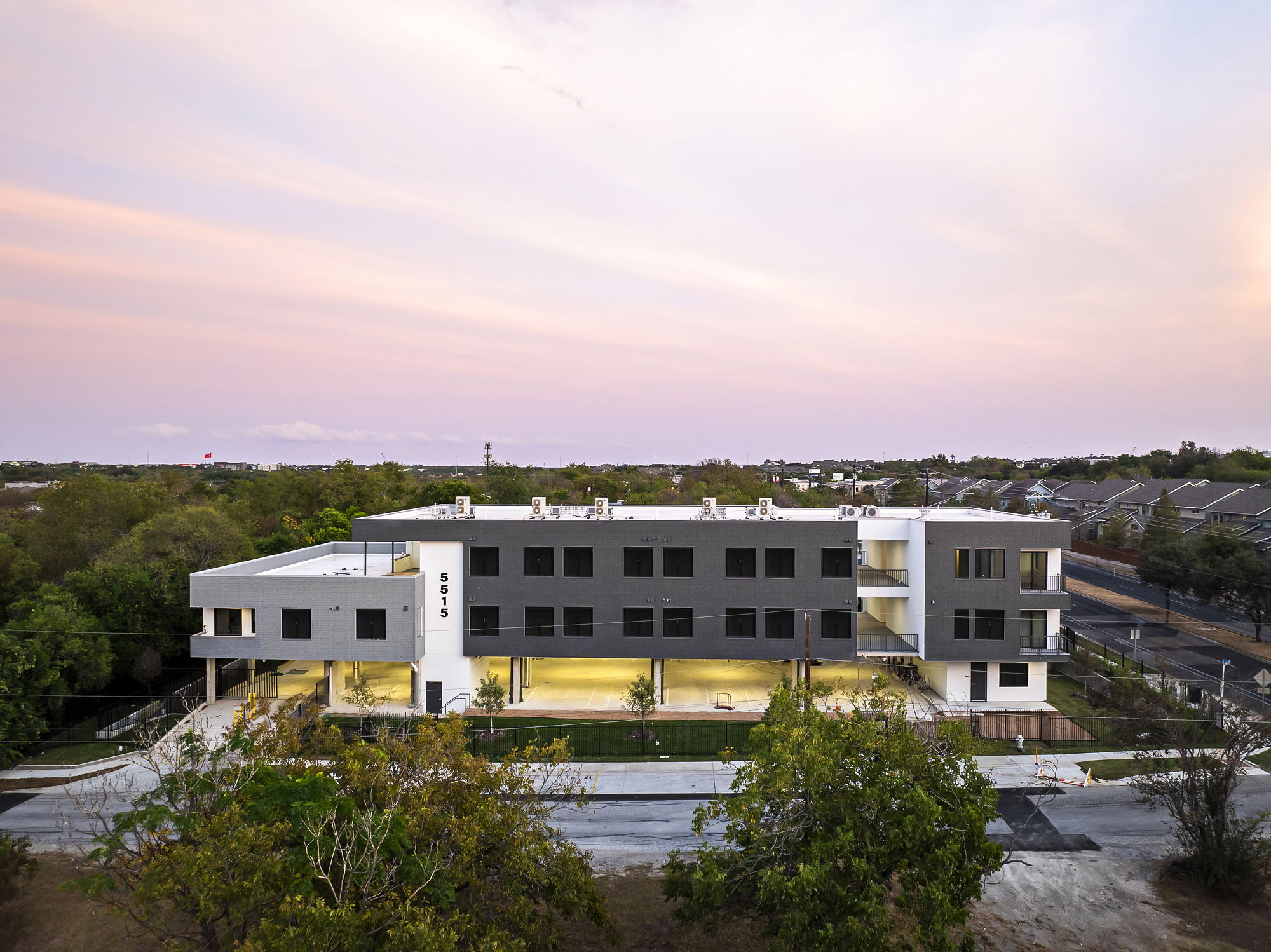 5515 Humming Bird Lane, Unit 306 Austin, TX 78745 - Photo 7 of 29 View of property at dusk