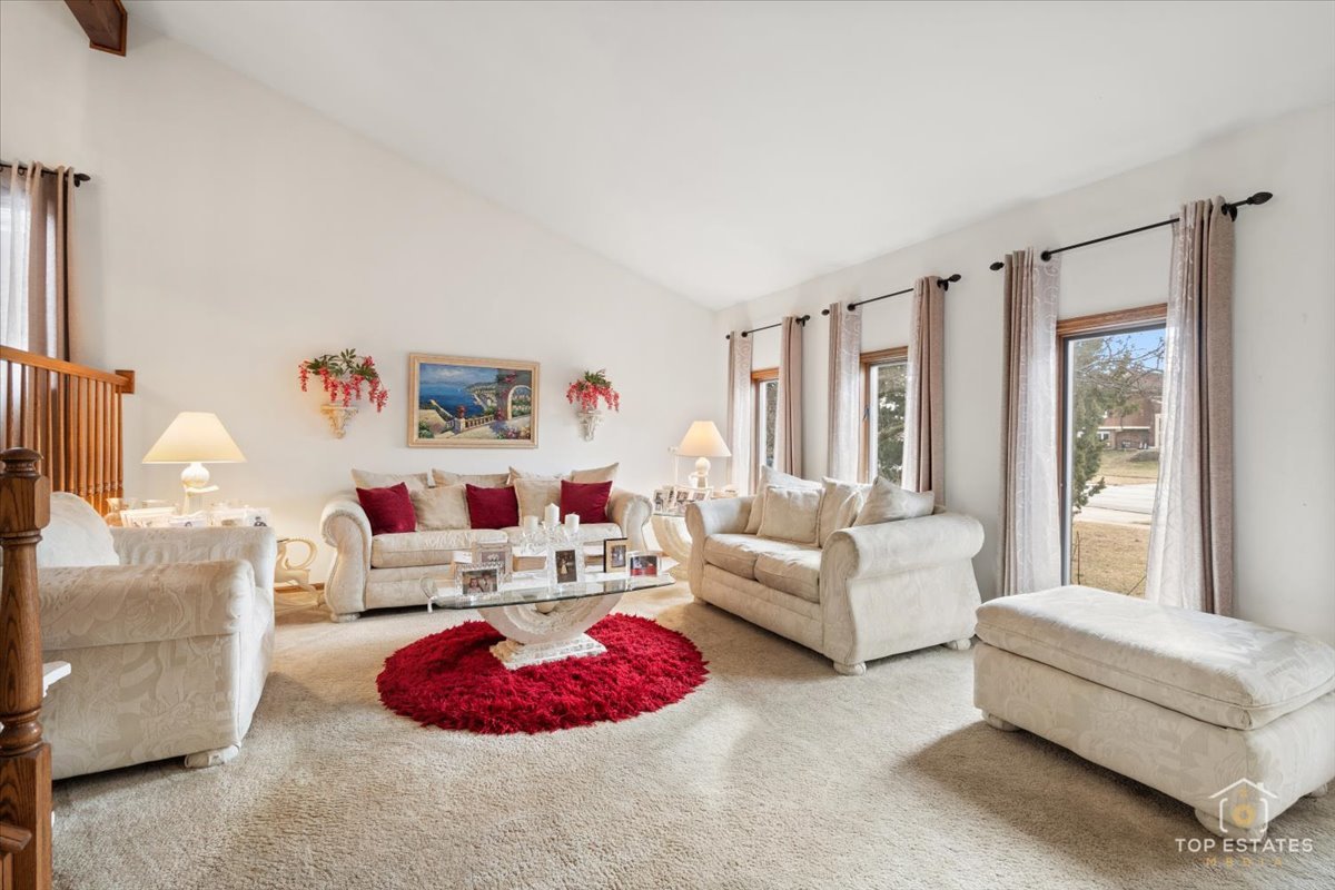 5844 West 124th Street Alsip, IL 60803 - Photo 12 of 44 a living room with furniture and a floor to ceiling window