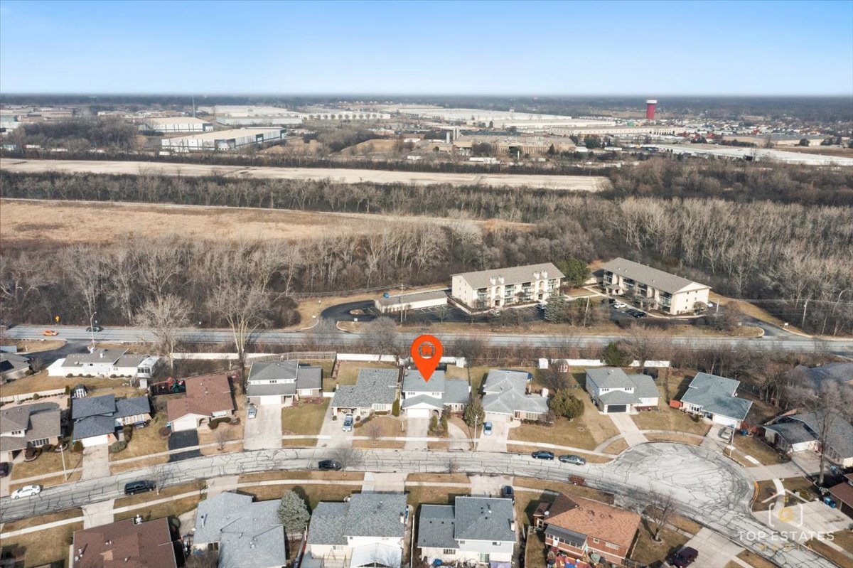 5844 West 124th Street Alsip, IL 60803 - Photo 3 of 44 an aerial view of residential houses with outdoor space