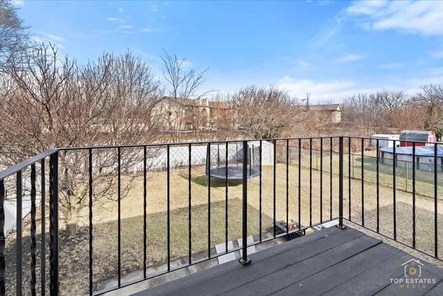 a view of wooden balcony with outdoor space