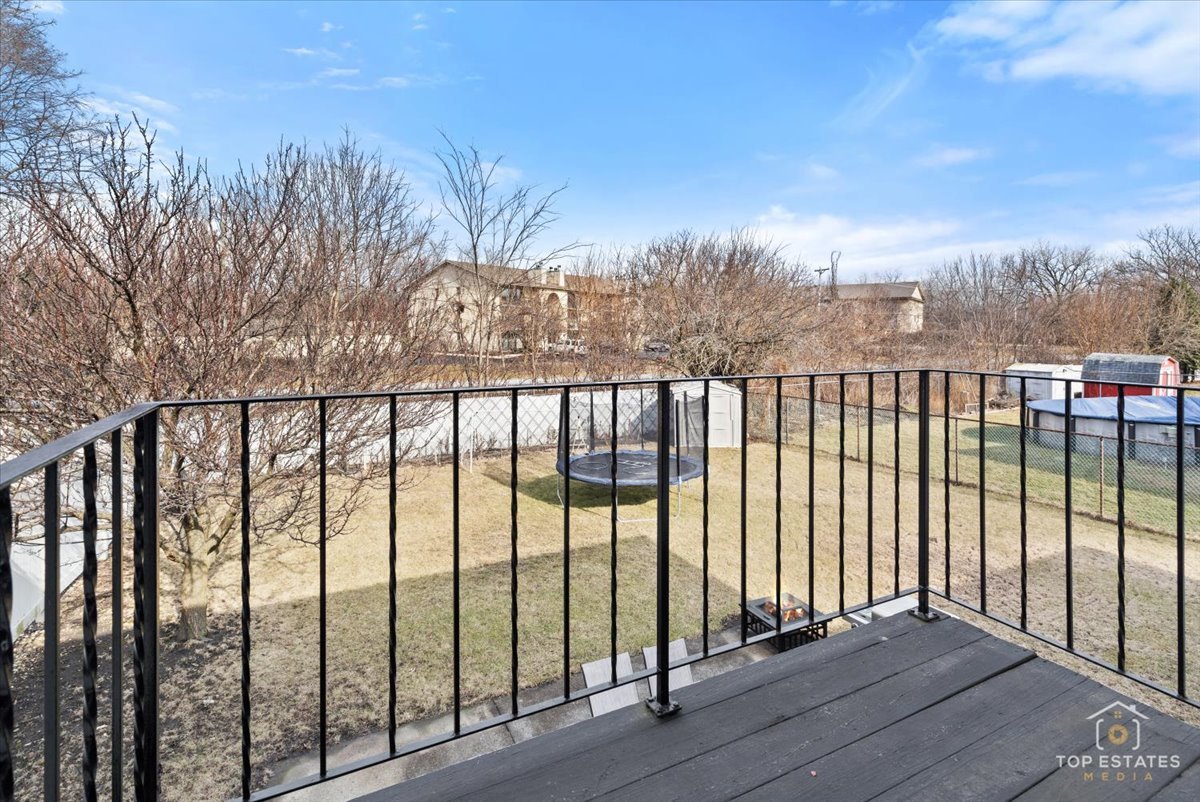 5844 West 124th Street Alsip, IL 60803 - Photo 35 of 44 a view of wooden balcony with outdoor space