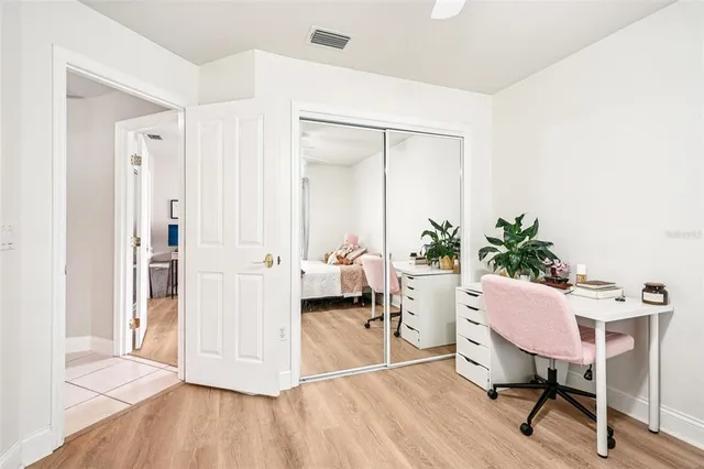 a workspace with furniture and wooden floor