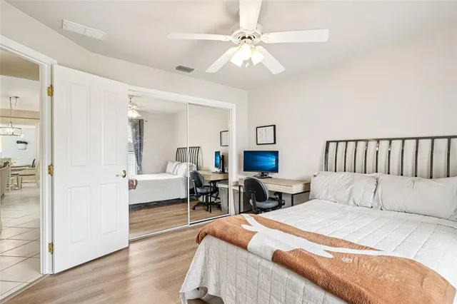 a bedroom with furniture and a bed