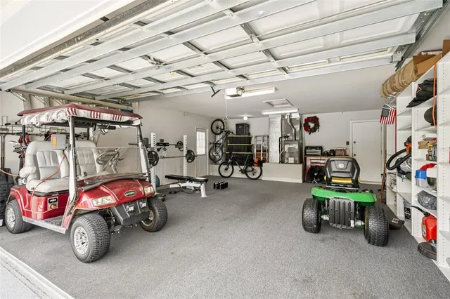 a view of a garage with a table and chairs