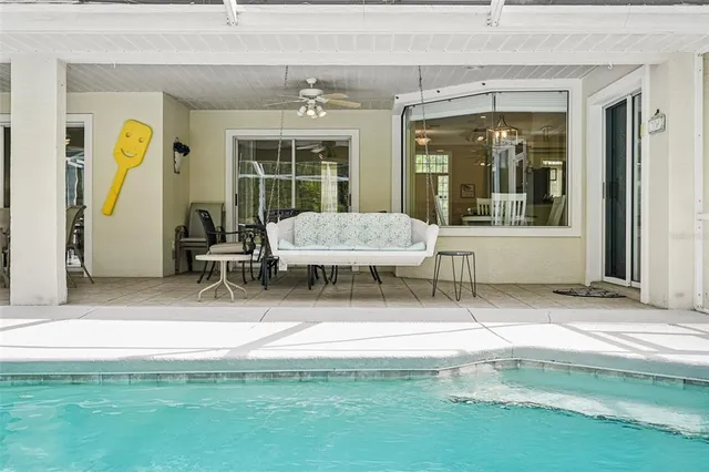 a view of a house with porch and sitting area