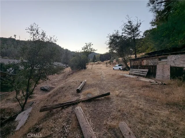 a view of a car is parked on the side of the road