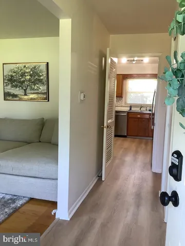 a view of bathroom with a tub shower and a sink